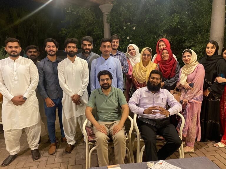 EcomXpert students and trainers at a course completion dinner in Lahore
